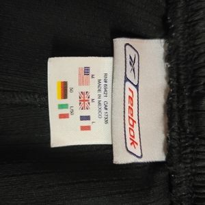 Medium black mesh gym shorts.